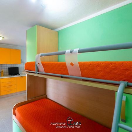 Apartments Casa Vacanze Porto Pino Exteriör bild