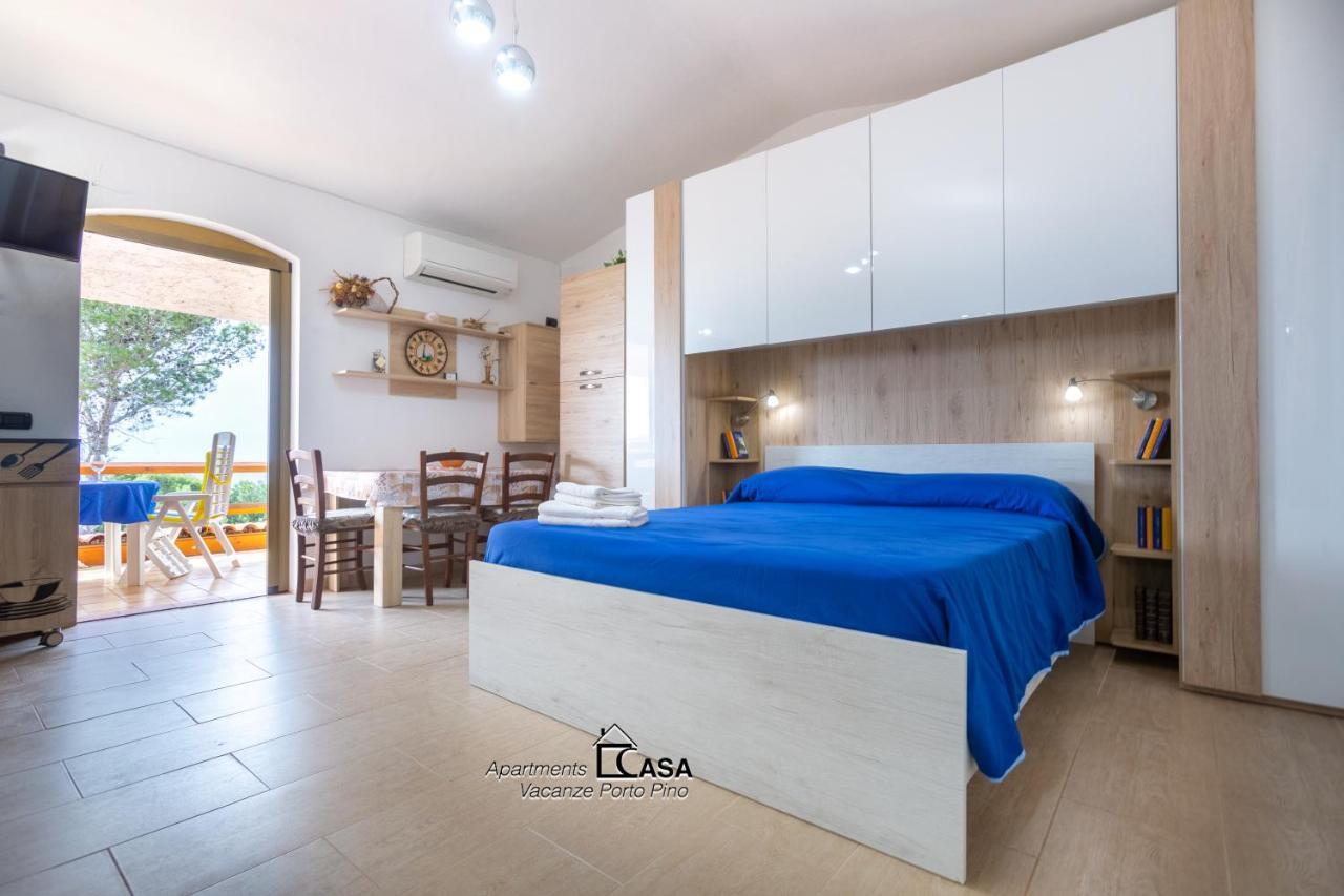 Apartments Casa Vacanze Porto Pino Exteriör bild