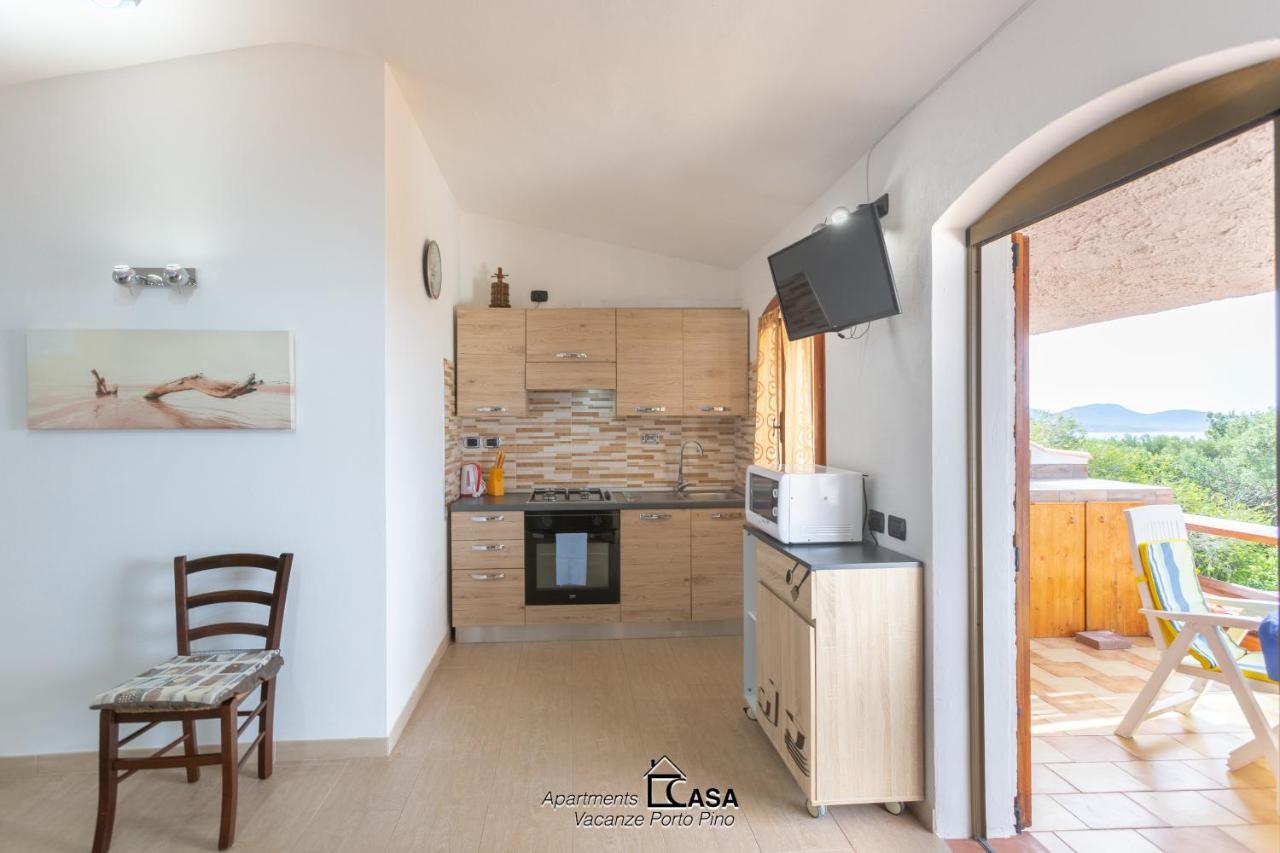 Apartments Casa Vacanze Porto Pino Exteriör bild