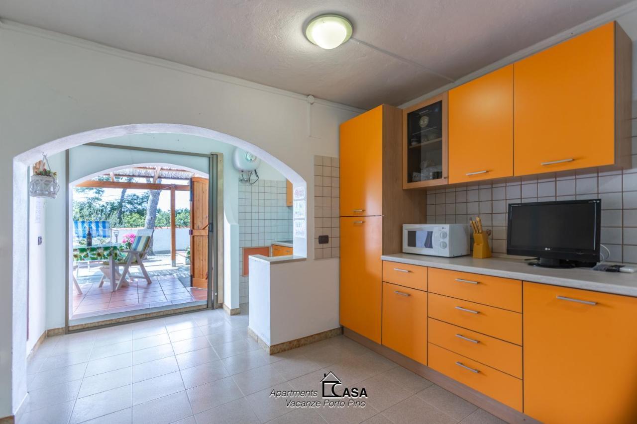Apartments Casa Vacanze Porto Pino Exteriör bild