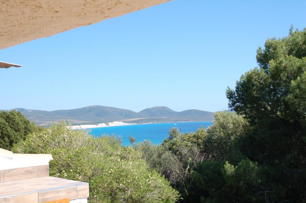 Apartments Casa Vacanze Porto Pino Exteriör bild